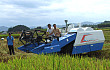 广西柳州举办千亩水稻生产全程机械化示范区机收现场会